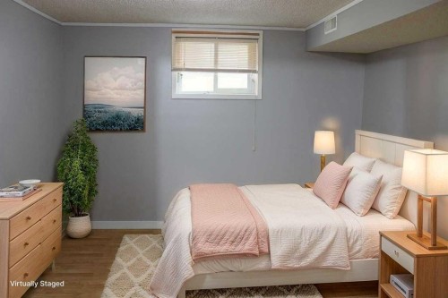 23 Pine Avenue West, Brooks, AB - Indoor Photo Showing Bedroom