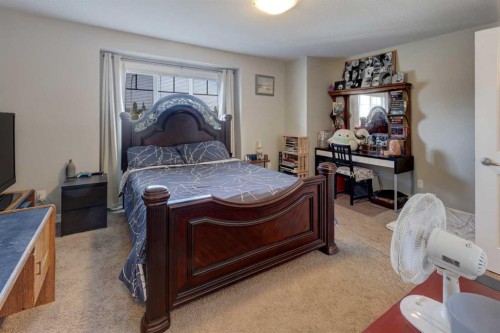 131 Copperpond Common Se, Calgary, AB - Indoor Photo Showing Bedroom