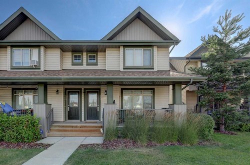 131 Copperpond Common Se, Calgary, AB - Outdoor With Deck Patio Veranda With Facade