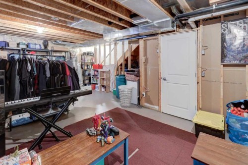 131 Copperpond Common Se, Calgary, AB - Indoor Photo Showing Basement