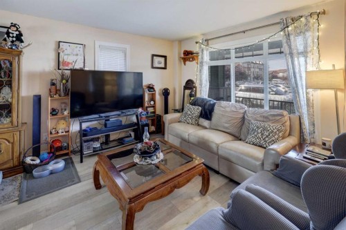 131 Copperpond Common Se, Calgary, AB - Indoor Photo Showing Living Room