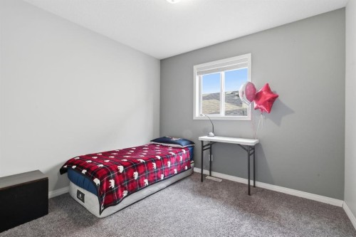 76 Crystalridge Crescent, Okotoks, AB - Indoor Photo Showing Bedroom