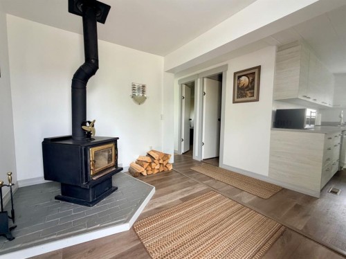 205 2 Street West, Munson, AB - Indoor With Fireplace