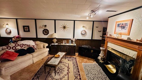 44 Cedar Crescent, Drumheller, AB - Indoor With Fireplace