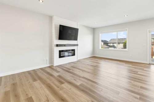 38 Bardwell Way, Sylvan Lake, AB - Indoor Photo Showing Living Room With Fireplace