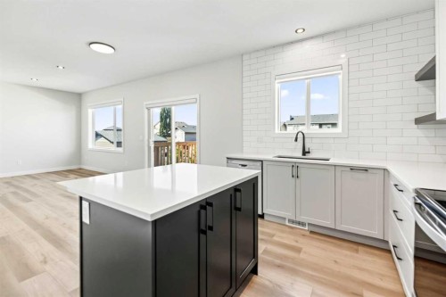 38 Bardwell Way, Sylvan Lake, AB - Indoor Photo Showing Kitchen With Upgraded Kitchen