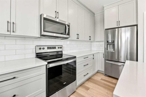 38 Bardwell Way, Sylvan Lake, AB - Indoor Photo Showing Kitchen With Stainless Steel Kitchen With Upgraded Kitchen
