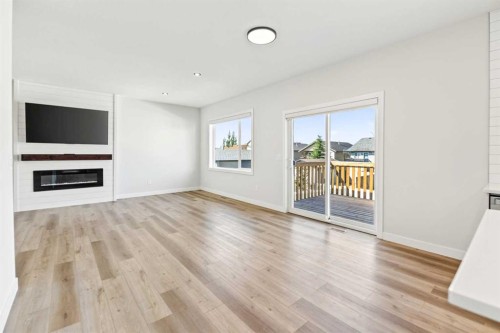 38 Bardwell Way, Sylvan Lake, AB - Indoor Photo Showing Living Room With Fireplace
