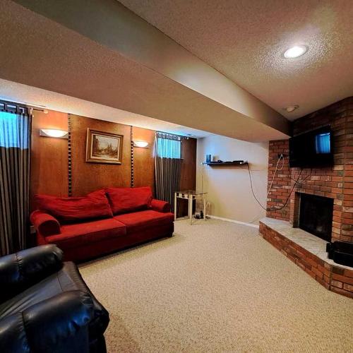 4113 52 Avenue, Lloydminster, AB - Indoor With Fireplace