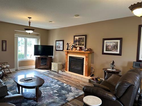 476 5 Street East, St. Walburg, SK - Indoor Photo Showing Living Room With Fireplace