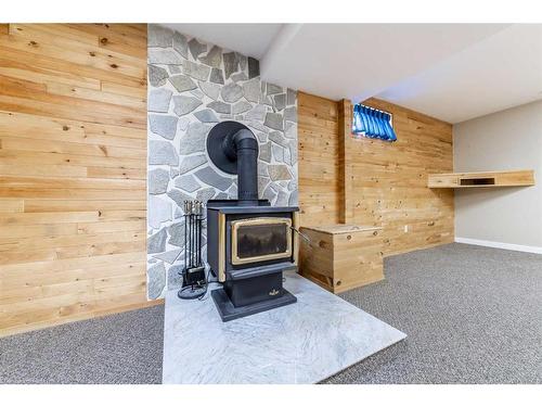 4905 52 Avenue, Kitscoty, AB - Indoor Photo Showing Other Room With Fireplace