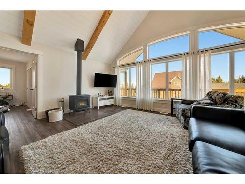 706 Willow Bay, Brightsand Lake, SK - Indoor Photo Showing Living Room With Fireplace