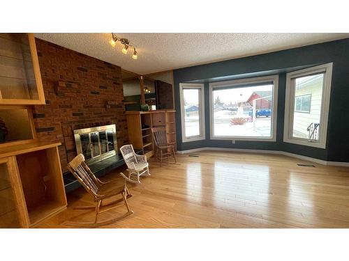 1621 4 Avenue, Wainwright, AB - Indoor With Fireplace