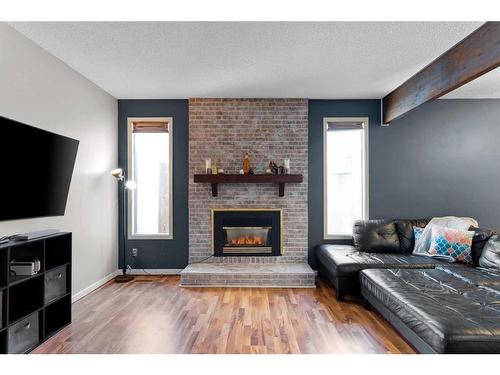 2905 54 Avenue, Lloydminster, AB - Indoor Photo Showing Living Room With Fireplace