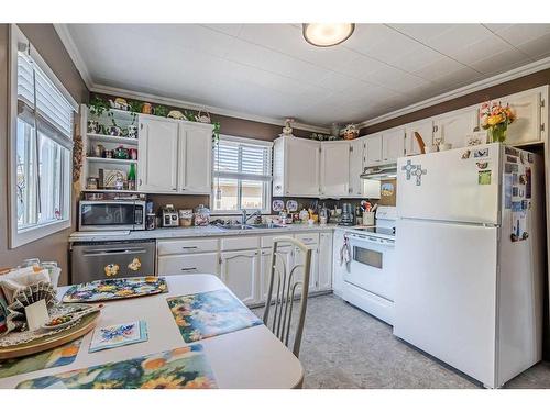 4837 50 Avenue, Kitscoty, AB - Indoor Photo Showing Kitchen With Double Sink