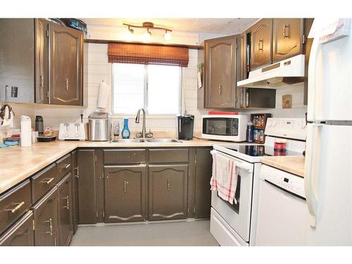 213 6 Avenue, Maidstone, SK - Indoor Photo Showing Kitchen With Double Sink
