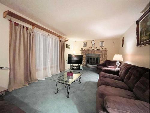 5123 55 Avenue, Edgerton, AB - Indoor Photo Showing Living Room With Fireplace