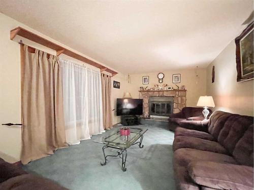 5123 55 Avenue, Edgerton, AB - Indoor Photo Showing Living Room With Fireplace