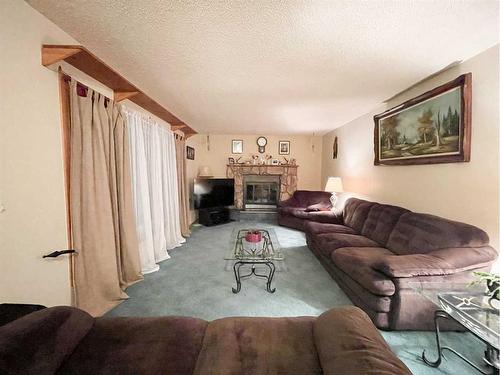 5123 55 Avenue, Edgerton, AB - Indoor Photo Showing Living Room With Fireplace