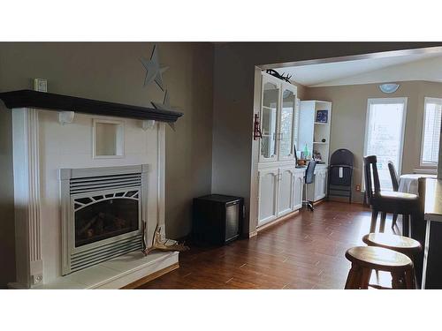4433 55 Avenue, Provost, AB - Indoor Photo Showing Living Room With Fireplace