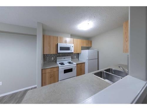 Bldg 1-1901 52 Avenue, Lloydminster, AB - Indoor Photo Showing Kitchen With Double Sink