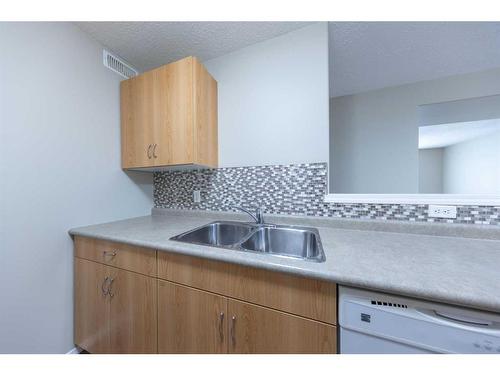 Bldg 1-1901 52 Avenue, Lloydminster, AB - Indoor Photo Showing Kitchen With Double Sink