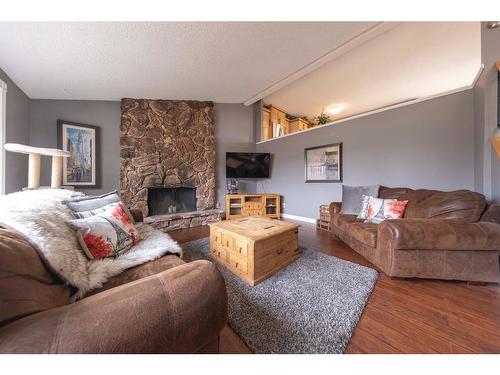 3908 53 Avenue, Lloydminster, AB - Indoor Photo Showing Living Room With Fireplace