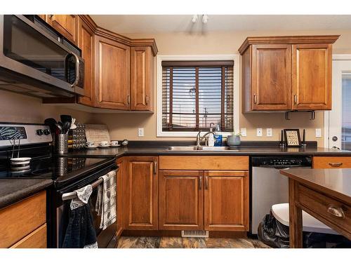 5302 50 Street, Kitscoty, AB - Indoor Photo Showing Kitchen With Double Sink