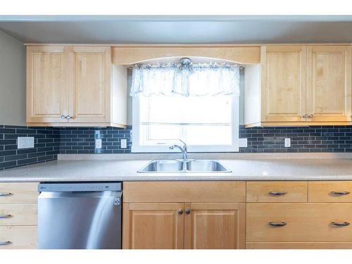 6512 34 Street, Lloydminster, AB - Indoor Photo Showing Kitchen With Double Sink