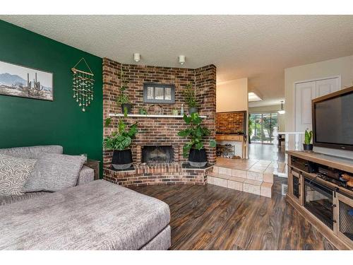 5514 38 Street, Lloydminster, AB - Indoor Photo Showing Living Room With Fireplace