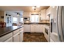 909 8 Avenue, Wainwright, AB  - Indoor Photo Showing Kitchen With Double Sink 