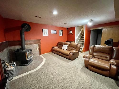 406 Railway Avenue, Paradise Valley, AB - Indoor With Fireplace