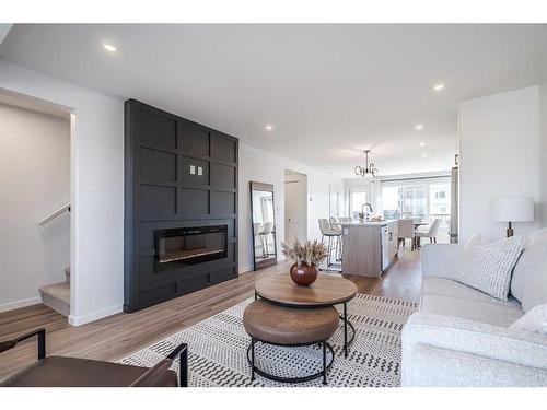 12-3616 41B Avenue, Lloydminster, SK - Indoor Photo Showing Living Room With Fireplace