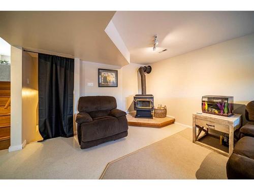 314 15 Street, Wainwright, AB - Indoor With Fireplace