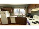 1113 4Th Avenue, Wainwright, AB  - Indoor Photo Showing Kitchen With Double Sink 