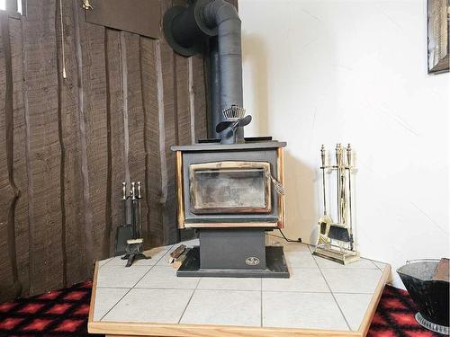 10 Coutts Street, Hughenden, AB - Indoor With Fireplace