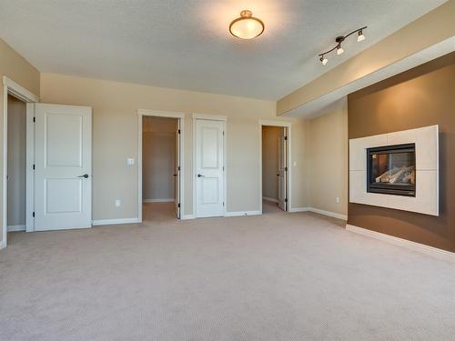 403-4102 69 Avenue, Lloydminster, AB - Indoor With Fireplace