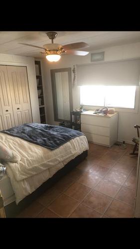 480081 Highway 897, Rural Vermilion River, County Of, AB - Indoor Photo Showing Bedroom
