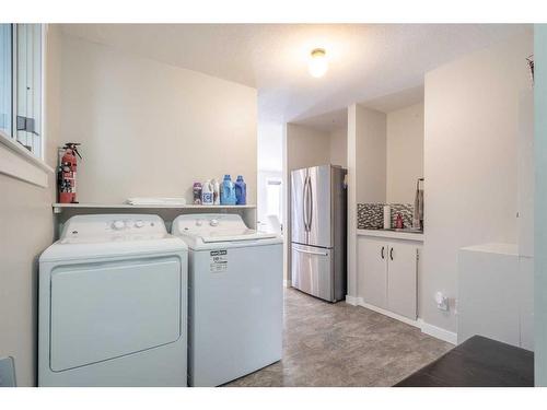 211 1St Street, Paradise Hill, SK - Indoor Photo Showing Laundry Room