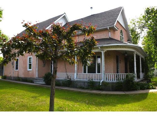 1202 2 Avenue, Wainwright, AB - Outdoor With Deck Patio Veranda With Facade