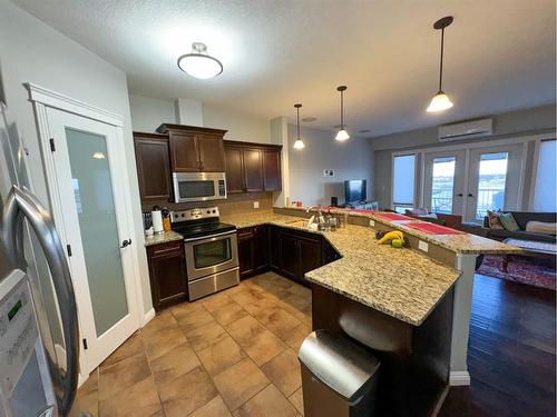 415-4102 69 Avenue, Lloydminster, AB - Indoor Photo Showing Kitchen With Upgraded Kitchen