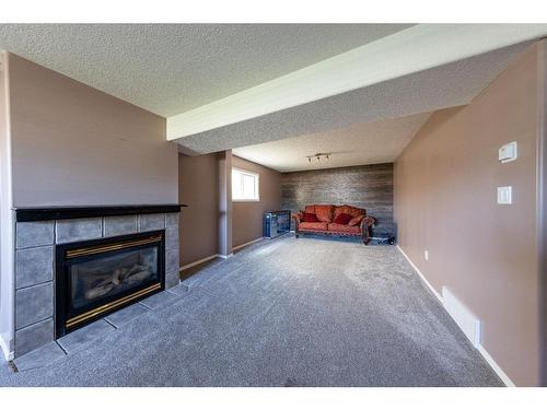 3912 66 Avenue, Lloydminster, AB - Indoor Photo Showing Other Room With Fireplace