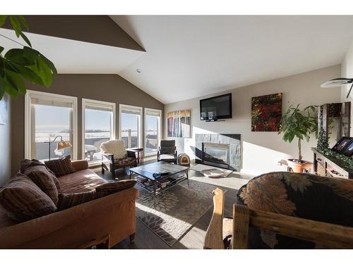 53-2715 73 Avenue, Lloydminster, AB - Indoor Photo Showing Living Room With Fireplace