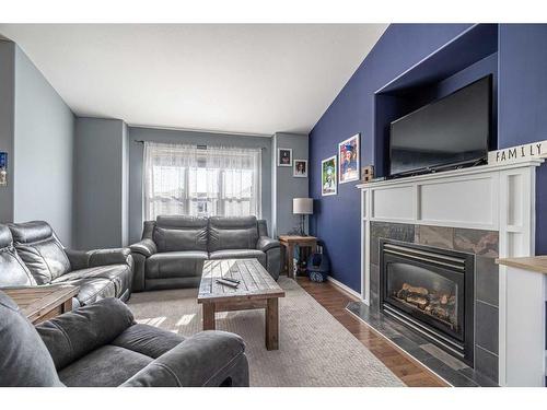 5212 21 Street, Lloydminster, AB - Indoor Photo Showing Living Room With Fireplace