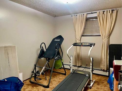 1114 4 Avenue, Wainwright, AB - Indoor Photo Showing Gym Room