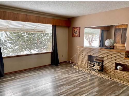 5526 49 Street, Provost, AB - Indoor With Fireplace
