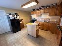 1306 15 Street, Wainwright, AB  - Indoor Photo Showing Kitchen With Double Sink 