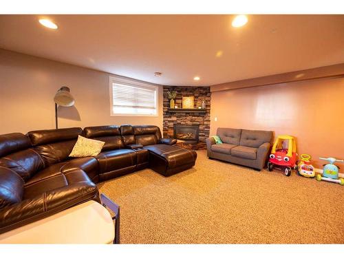 5135 57 Avenue, Edgerton, AB - Indoor Photo Showing Living Room With Fireplace