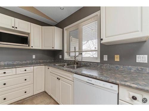 3604 63 Avenue Close, Lloydminster, AB - Indoor Photo Showing Kitchen With Double Sink