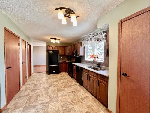 473035 Hwy 41, Rural Vermilion River, County Of, AB - Indoor Photo Showing Kitchen With Double Sink